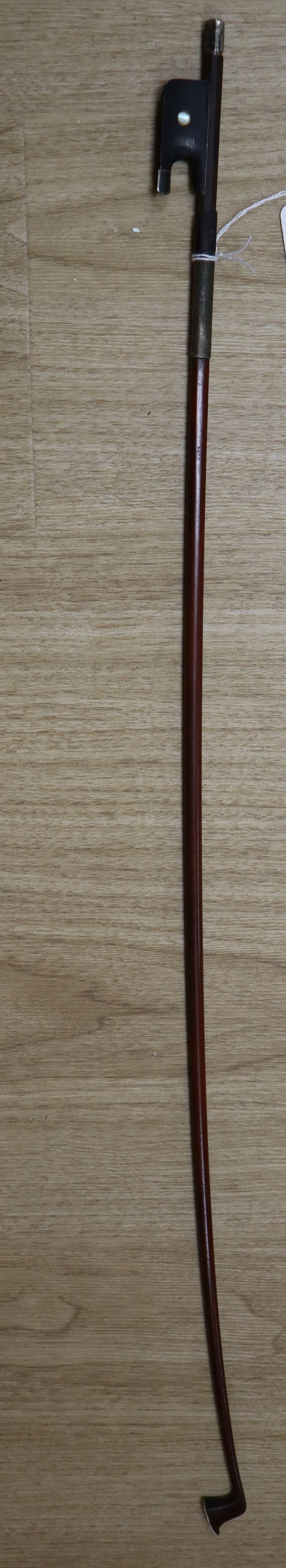 A silver-mounted violin bow, unsigned, 29in.